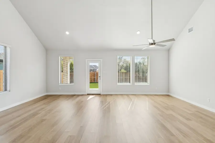 Living and Dining Rooms in the Winters home plan by Trophy Signature Homes – REPRESENTATIVE PHOTO