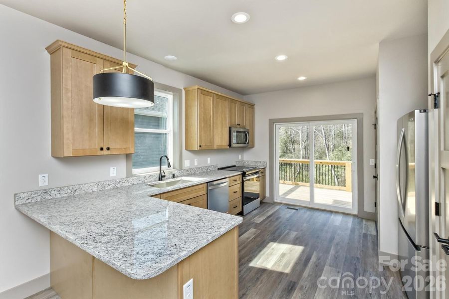 Furnished interior view inside a new home in , Asheville (Image 3).