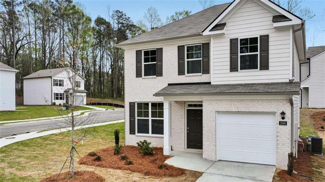 Front exterior of a new home in Sherwood Manor, College Park, GA, highlighting curb appeal (Image 19).