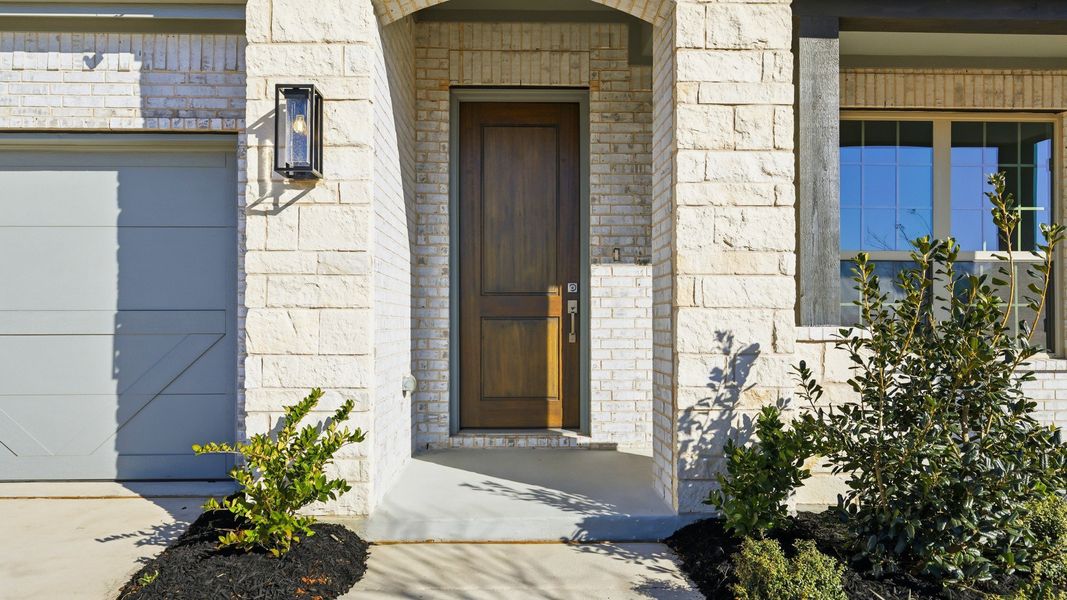 Exterior details and patio area of a home in Green Meadows Premier, Celina (Image 3). Exterior details and patio area of a home in Green Meadows Premier, Celina (Image 3).