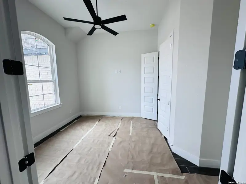 In-progress construction of a new home in Village at Three Oaks, Seguin, TX (Image 14).