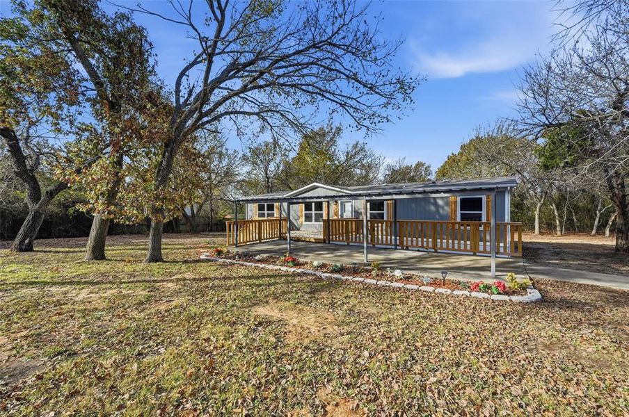 Exterior details and patio area of a home in , Springtown (Image 1). Exterior details and patio area of a home in , Springtown (Image 1).