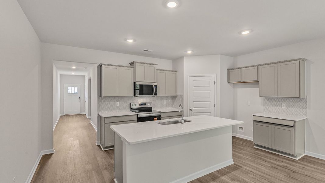 Representative furnished interior of a home built from the Celia by D.R. Horton in Teamon Pointe, Griffin (Image 5).