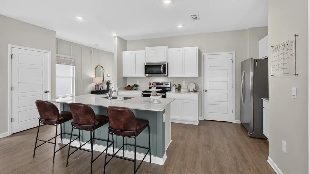 Furnished interior view inside a new home in Rookery, Green Cove Springs (Image 7).