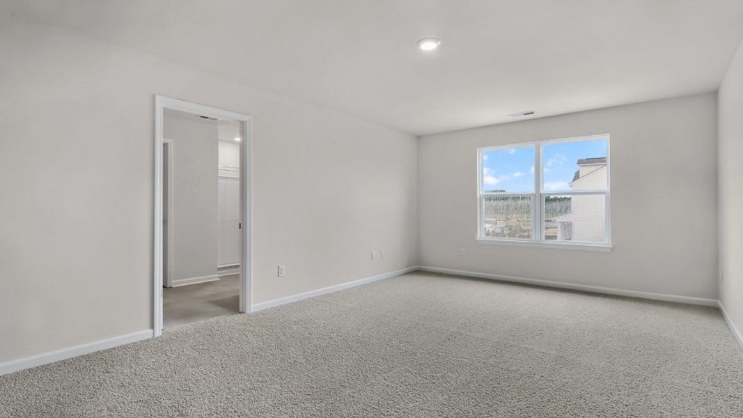 Spacious, unfurnished interior of a new home in The Reserve at Prestleigh, Wake Forest (Image 13).