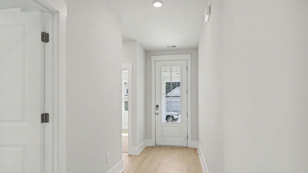 Representative unfurnished interior of a home built from the Calvert by D.R. Horton in Chapman Village, Conway (Image 8).