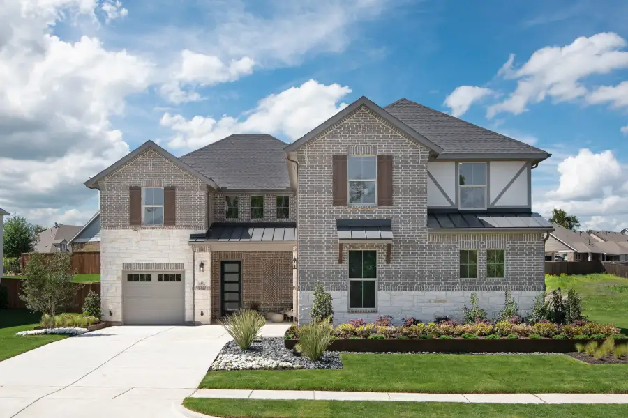 Front exterior of a new home in Somerset Park, Rockwall, TX, highlighting curb appeal (Image 2). Front exterior of a new home in Somerset Park, Rockwall, TX, highlighting curb appeal (Image 2).
