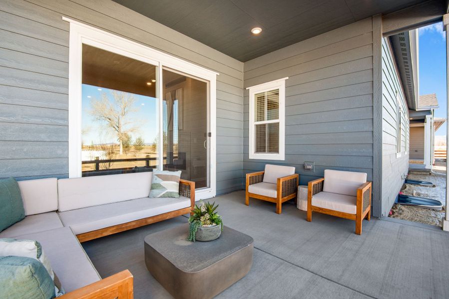 Exterior details and patio area of a home in Westside Crossing, Berthoud (Image 20).