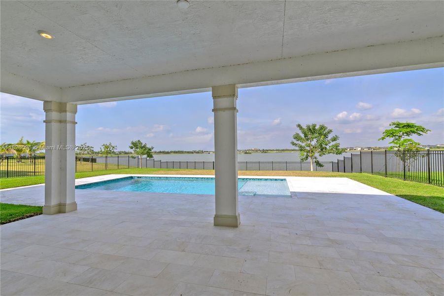 Exterior details and patio area of a home in Arden: The Waterford Collection, Loxahatchee (Image 29).