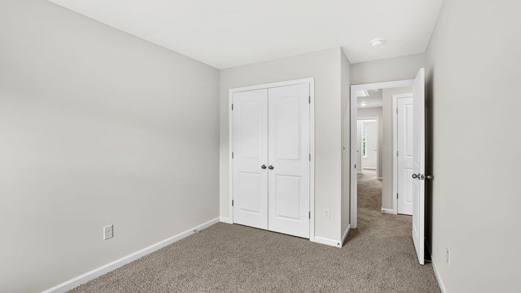Spacious, unfurnished interior of a new home in Tanglewood Townes, Greenville (Image 29).