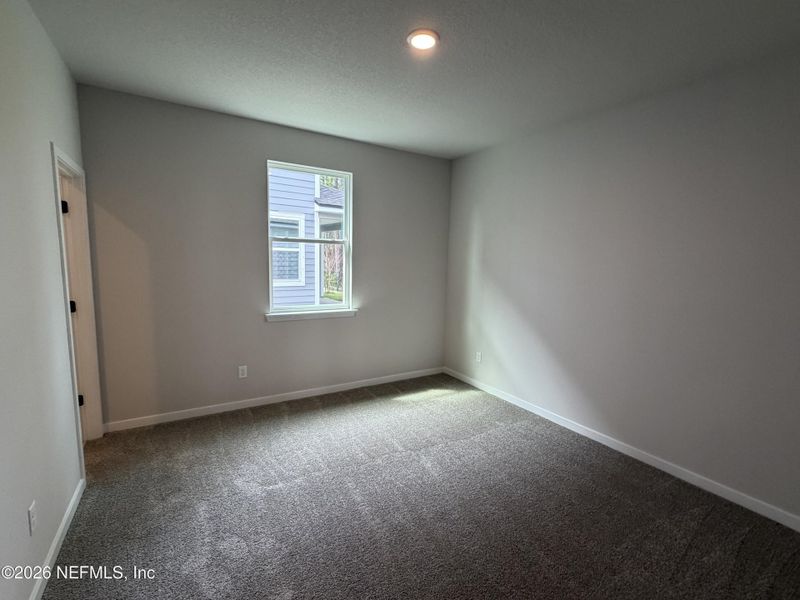 Spacious, unfurnished interior of a new home in Reserve East, Flagler Beach (Image 35).