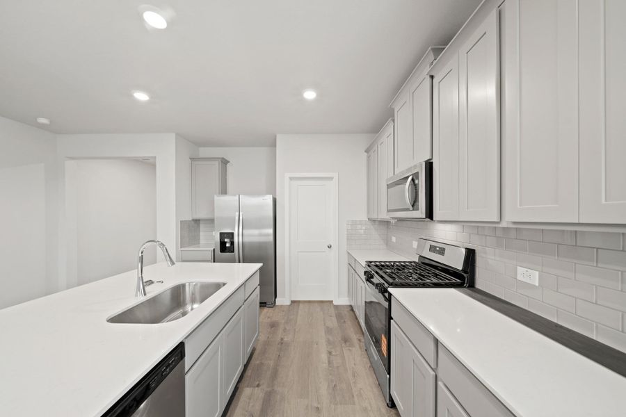 Furnished interior view inside a new home in Valor Park, Bay City (Image 6).