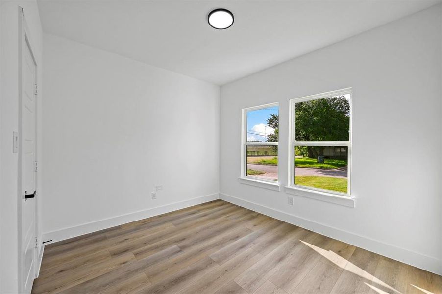 Unfurnished room featuring light hardwood / wood-style flooring