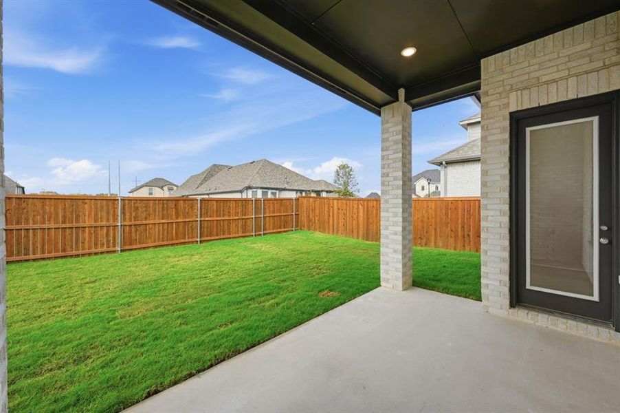 Exterior details and patio area of a home in Wellington: Artisan Series - 50ft lots, Haslet (Image 2).