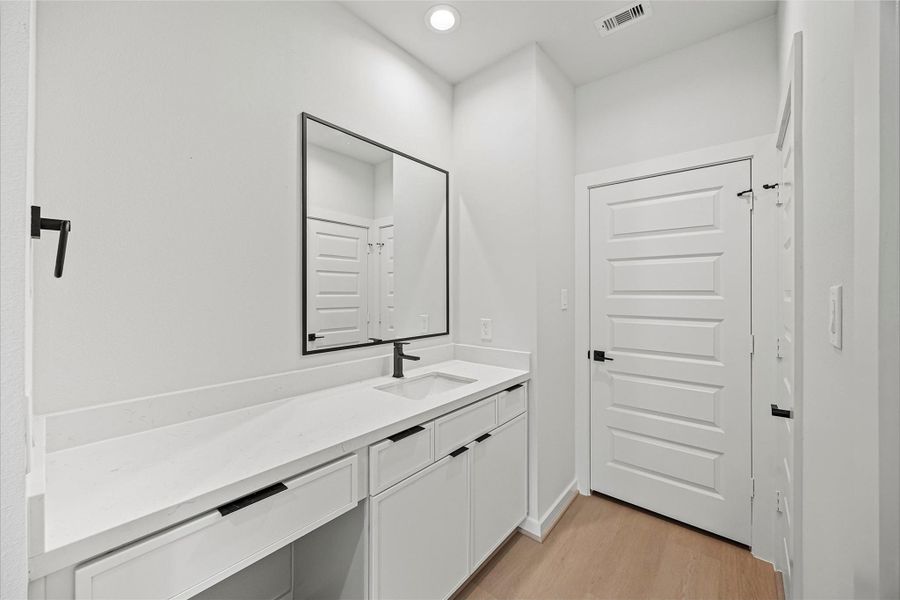 Furnished interior view inside a new home in Shepherd Heights, Houston (Image 10).