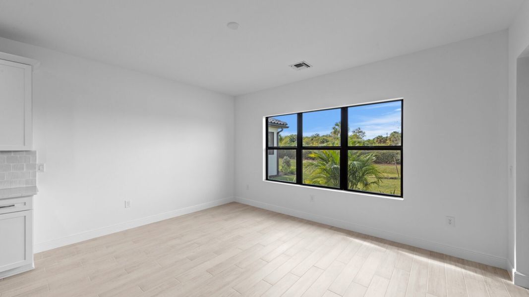 Spacious, unfurnished interior of a new home in SkySail, Naples (Image 29).