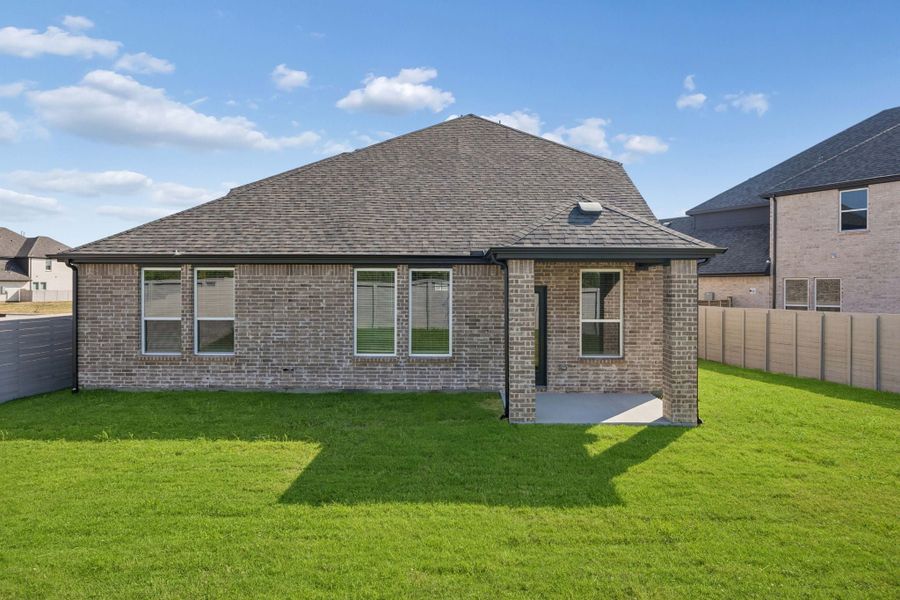 Exterior details and patio area of a home in Painted Tree Woodland West, McKinney (Image 22).