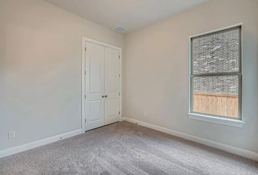 Spacious, unfurnished interior of a new home in 6 Creeks, Kyle (Image 9).