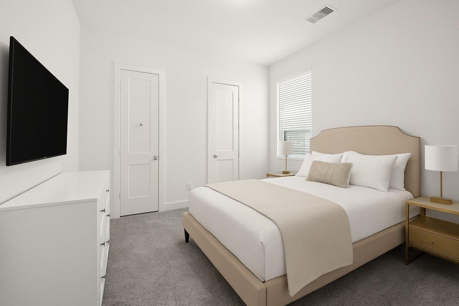 This secondary bedroom offers the perfect private retreat. Located just off the game room with its own separate entrance and a private ensuite bathroom, it's ideal for guests or as an in-law suite. *This photo has been virtually staged This secondary bedroom offers the perfect private retreat. Located just off the game room with its own separate entrance and a private ensuite bathroom, it's ideal for guests or as an in-law suite. *This photo has been virtually staged