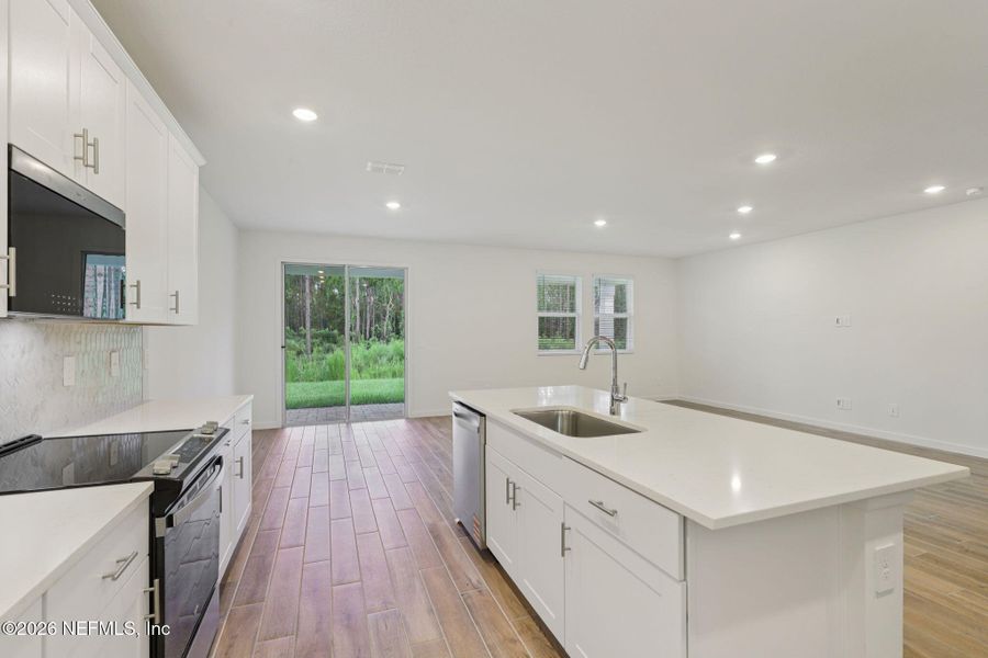 Furnished interior view inside a new home in Colbert Landings, Palm Coast (Image 5).
