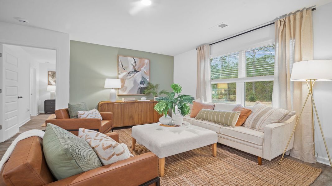 Representative furnished interior of a home built from the Freeport by D.R. Horton in Palm Ridge, Guyton (Image 8).