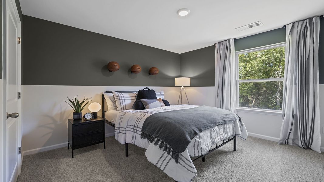 Furnished interior view inside a new home in Bentley Park, Greenwood (Image 27).