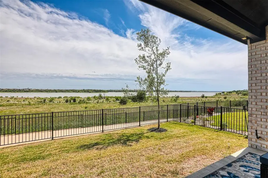 Exterior details and patio area of a home in , Little Elm (Image 22).