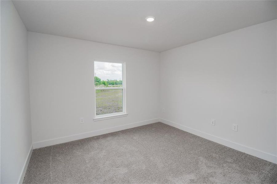 Spacious, unfurnished interior of a new home in Hickory Ridge Estates, Lake Wales (Image 18).