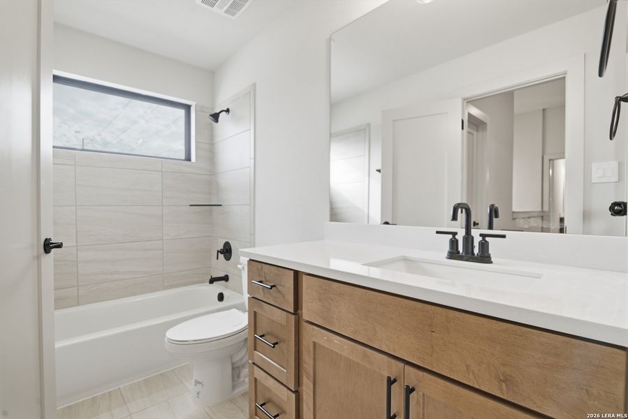 Furnished interior view inside a new home in Haby Hill 50s, San Antonio (Image 9).