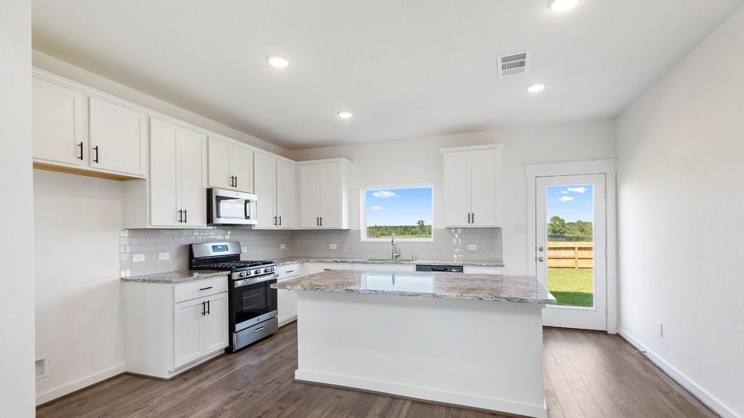 Furnished interior view inside a new home in Mostyn Springs, Magnolia (Image 11).