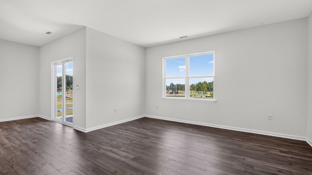 Spacious, unfurnished interior of a new home in The Grove at Matthews Landing, Fuquay Varina (Image 18).