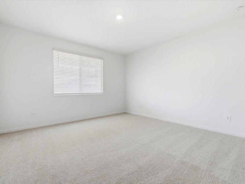 Spacious, unfurnished interior of a new home in Blossom Rock Reserve Series, Apache Junction (Image 16).