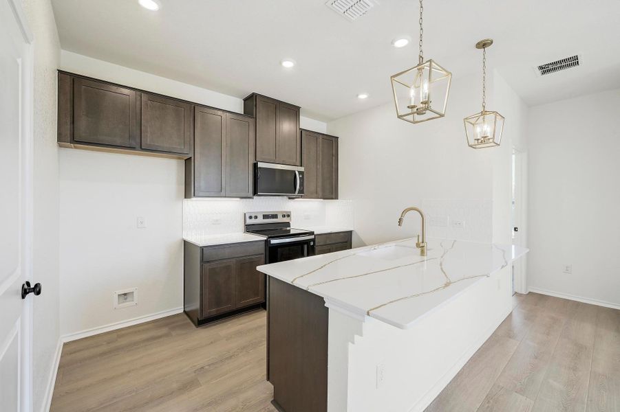Furnished interior view inside a new home in Creekside at Estancia, Austin (Image 8).