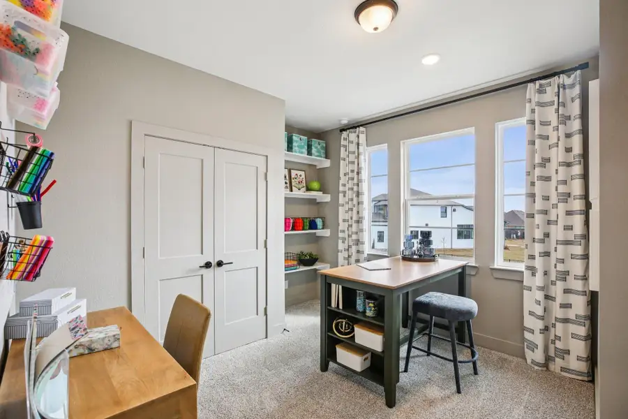 Furnished interior view inside a new home in Bridgeland, Cypress (Image 7).