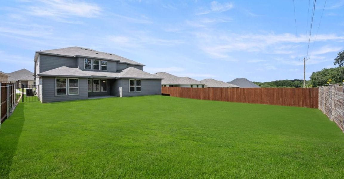 Representative exterior photo of a completed home built from the Hadleigh by Impression Homes in Mountain Valley, Burleson, TX (Image 26). Representative exterior photo of a completed home built from the Hadleigh by Impression Homes in Mountain Valley, Burleson, TX (Image 26).