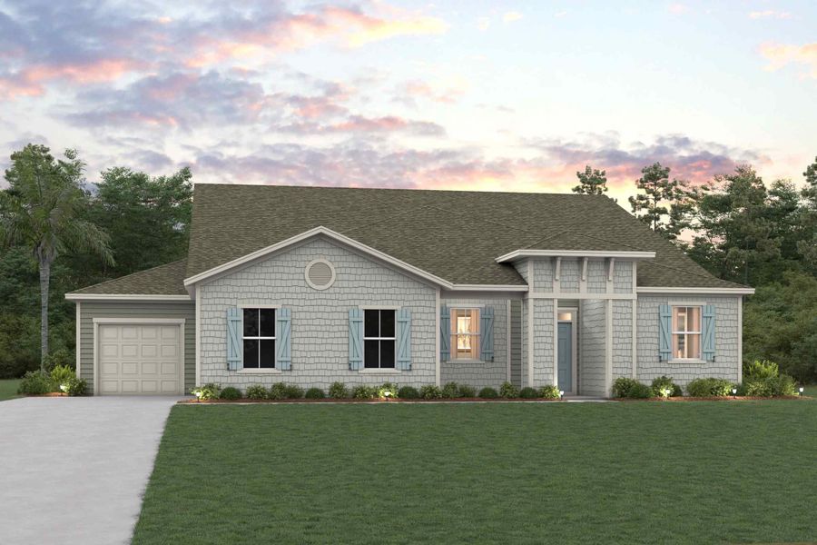 A house with a lawn in front of it.