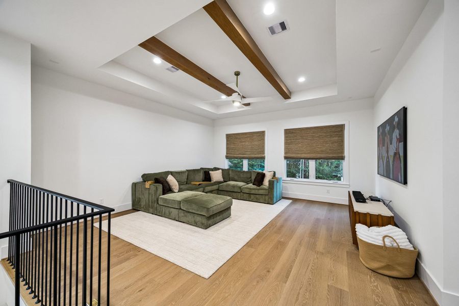 The upstairs game room opens to the landing and is ideally positioned for easy access to both the primary and secondary bedrooms.