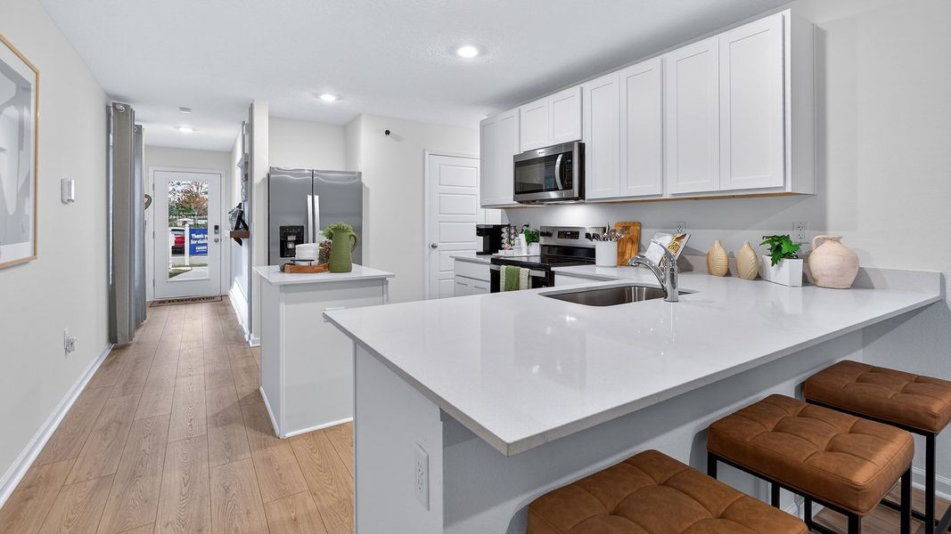 Representative furnished interior of a home built from the Carson by D.R. Horton in Hansen Creek, Jacksonville (Image 7).