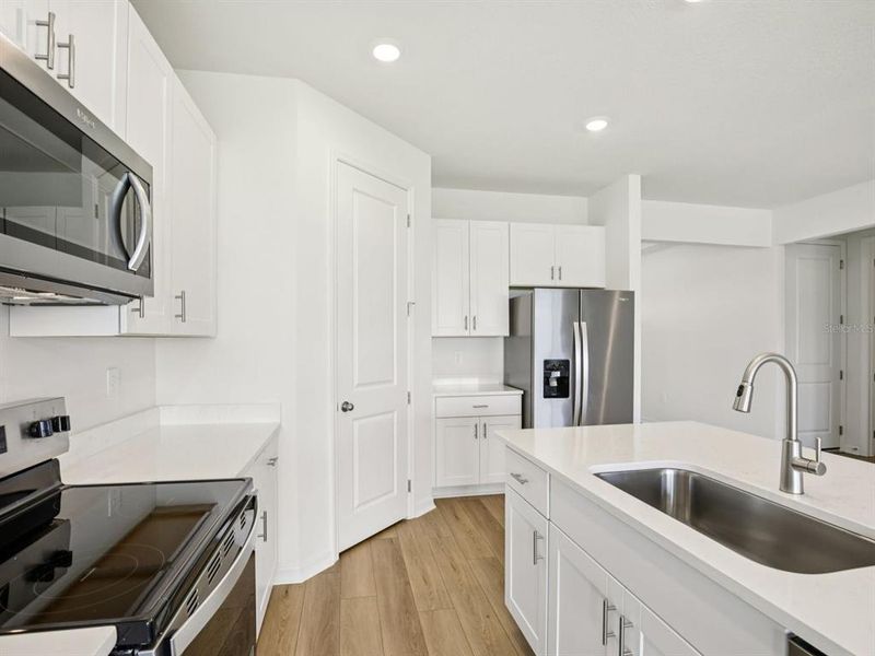 Furnished interior view inside a new home in Coasterra - Reserve Series, Palmetto (Image 10).