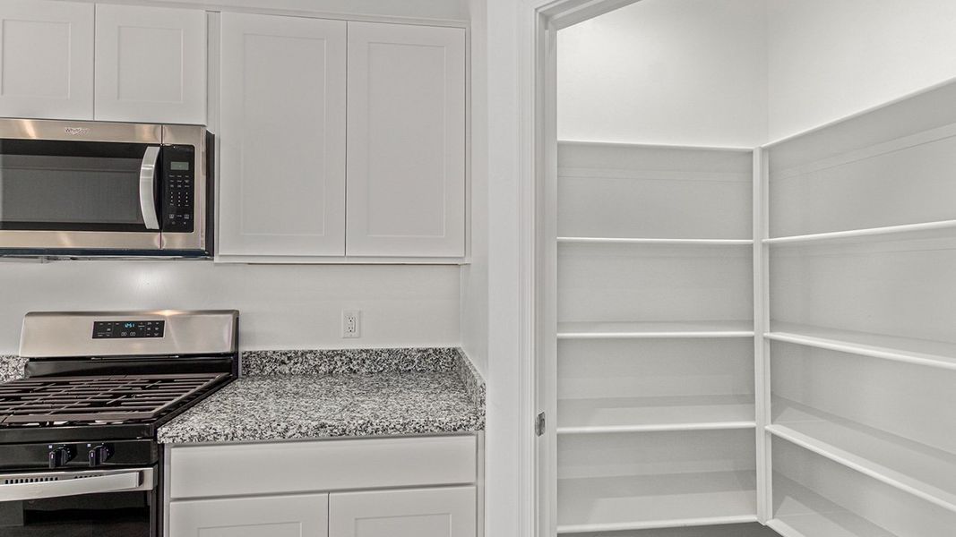 Furnished interior view inside a new home in The Oasis at Rocking K, Vail (Image 10). Furnished interior view inside a new home in The Oasis at Rocking K, Vail (Image 10).