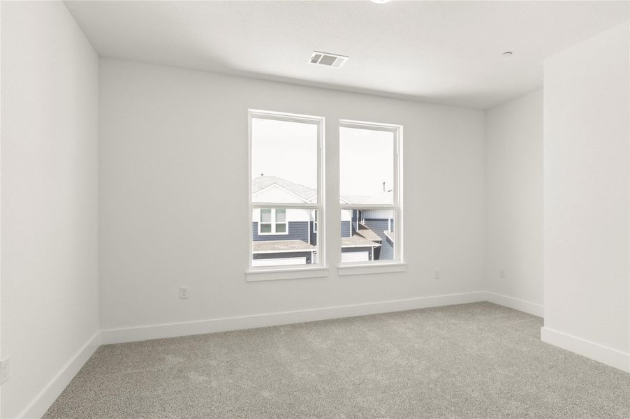 Unfurnished room featuring carpet flooring