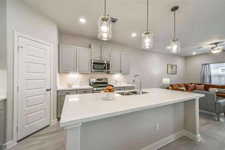 Photos are sample images from a previously built home with the same floor plan. Finishes and fixtures in the current home have been upgraded and may vary. Photos are sample images from a previously built home with the same floor plan. Finishes and fixtures in the current home have been upgraded and may vary.