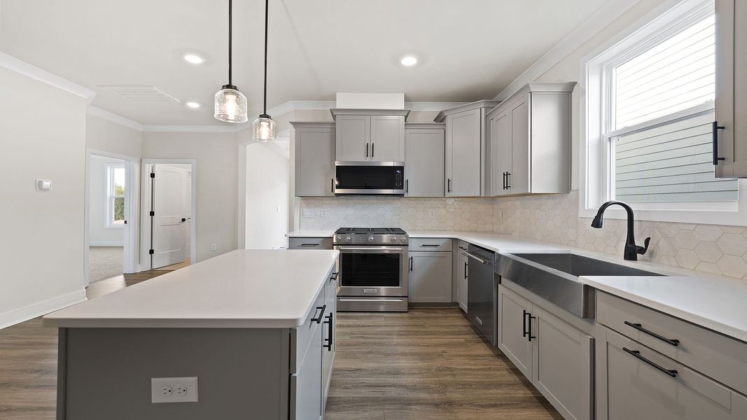 Representative furnished interior of a home built from the BERKSHIRE by D.R. Horton in Sycamore Cove, Woodruff (Image 7).