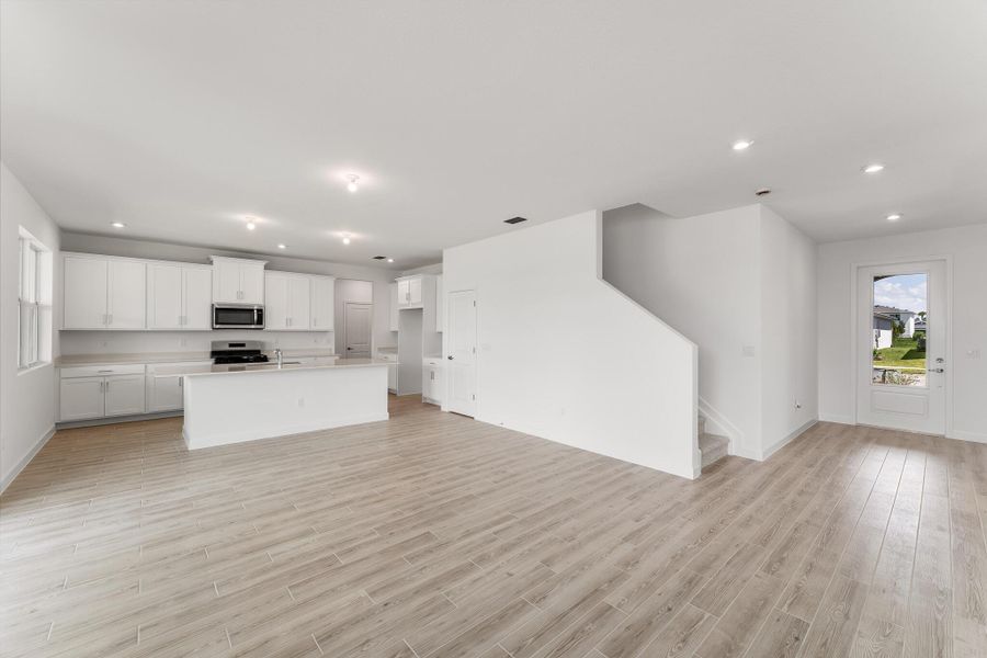 Spacious, unfurnished interior of a new home in Tradition - Cadence, Port St. Lucie (Image 15).