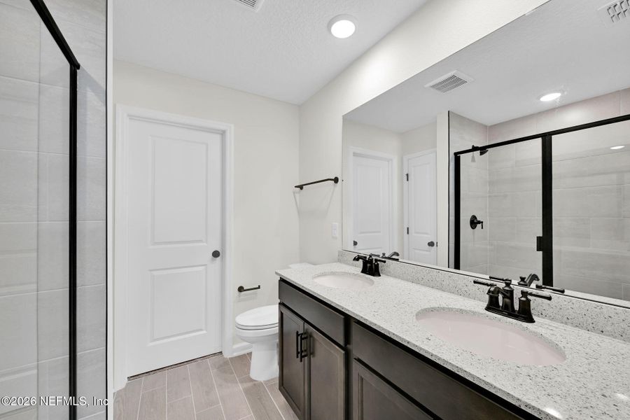 Furnished interior view inside a new home in Baxley Villas, Middleburg (Image 7).