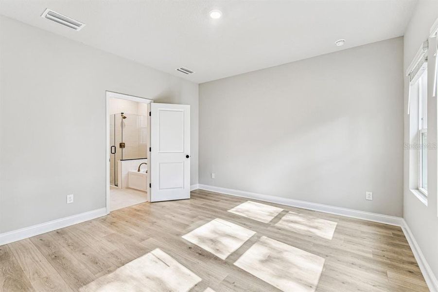 Spacious, unfurnished interior of a new home in Oakfield at Mount Dora Village Series, Mount Dora (Image 4).