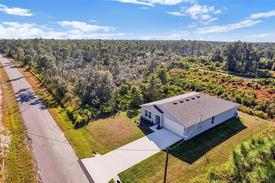 Front exterior of a new home in Sebring Classic, Sebring, FL, highlighting curb appeal (Image 8).