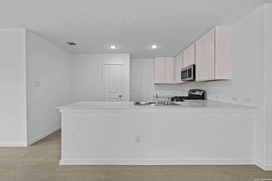 Furnished interior view inside a new home in Voss Farms, New Braunfels (Image 6). Furnished interior view inside a new home in Voss Farms, New Braunfels (Image 6).