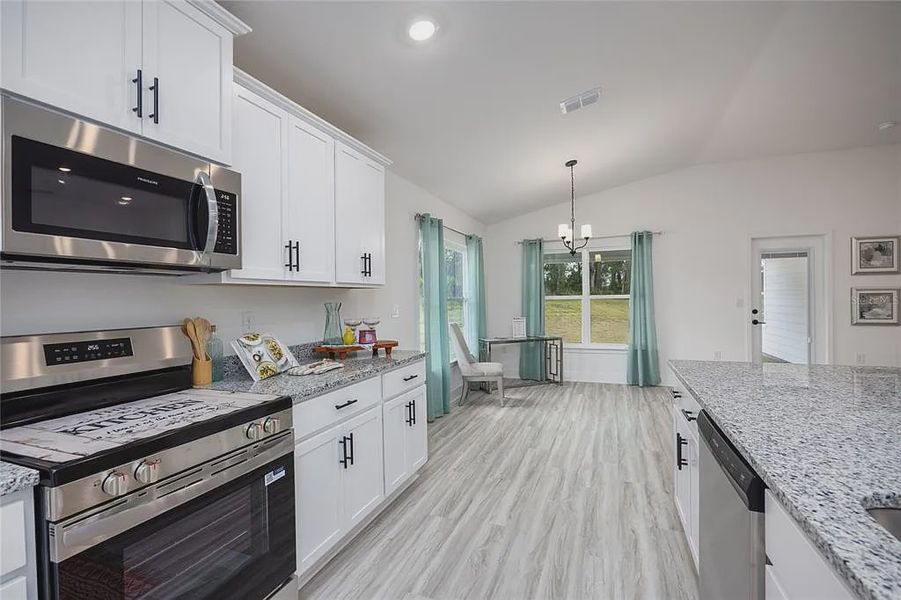 Furnished interior view inside a new home in Briarwood, Alachua (Image 14).