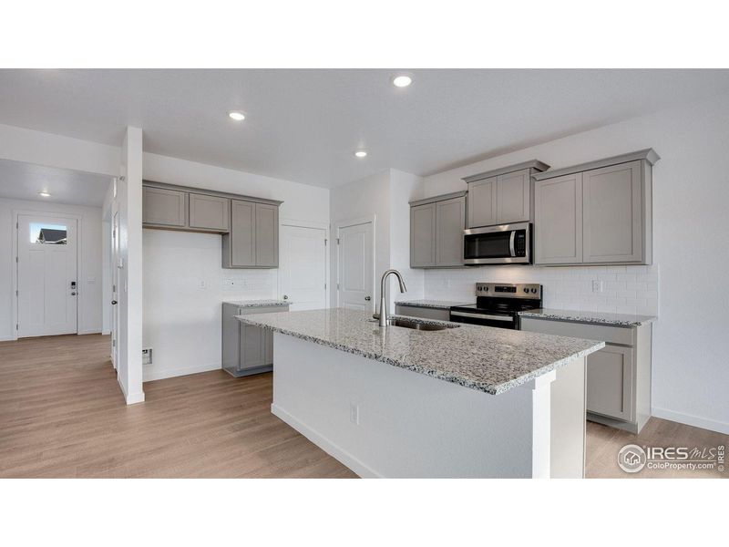 Furnished interior view inside a new home in Vista Meadows, Fort Lupton (Image 9).